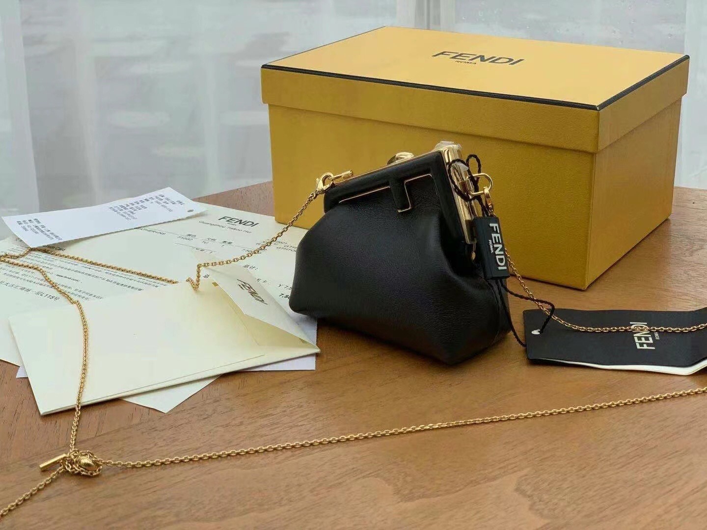 Fendi First Nano Charm Bag In Black Nappa Leather  049