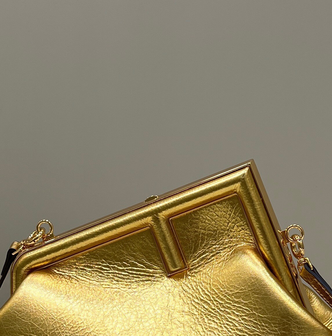 Fendi First Small Bag In Gold Laminated Leather 752