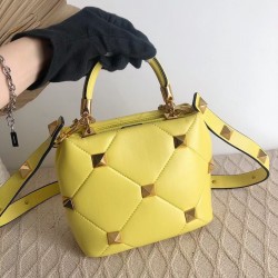 Valentino Small Roman Stud Top Handle Bag In Yellow Nappa 048