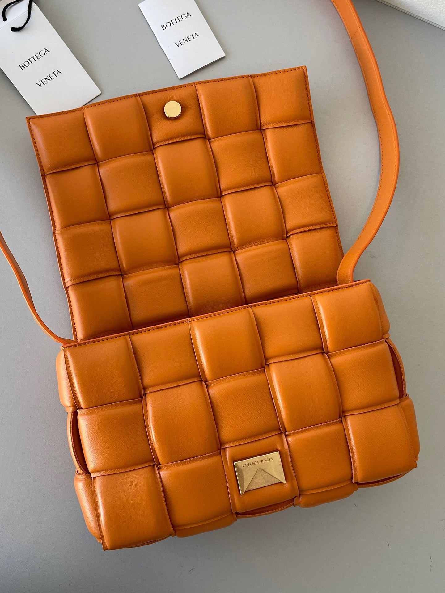Bottega Veneta Padded Cassette Bag In Orange Lambskin 621
